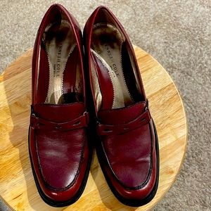 Used in good condition. Some wear on the soles. Color is burgundy.